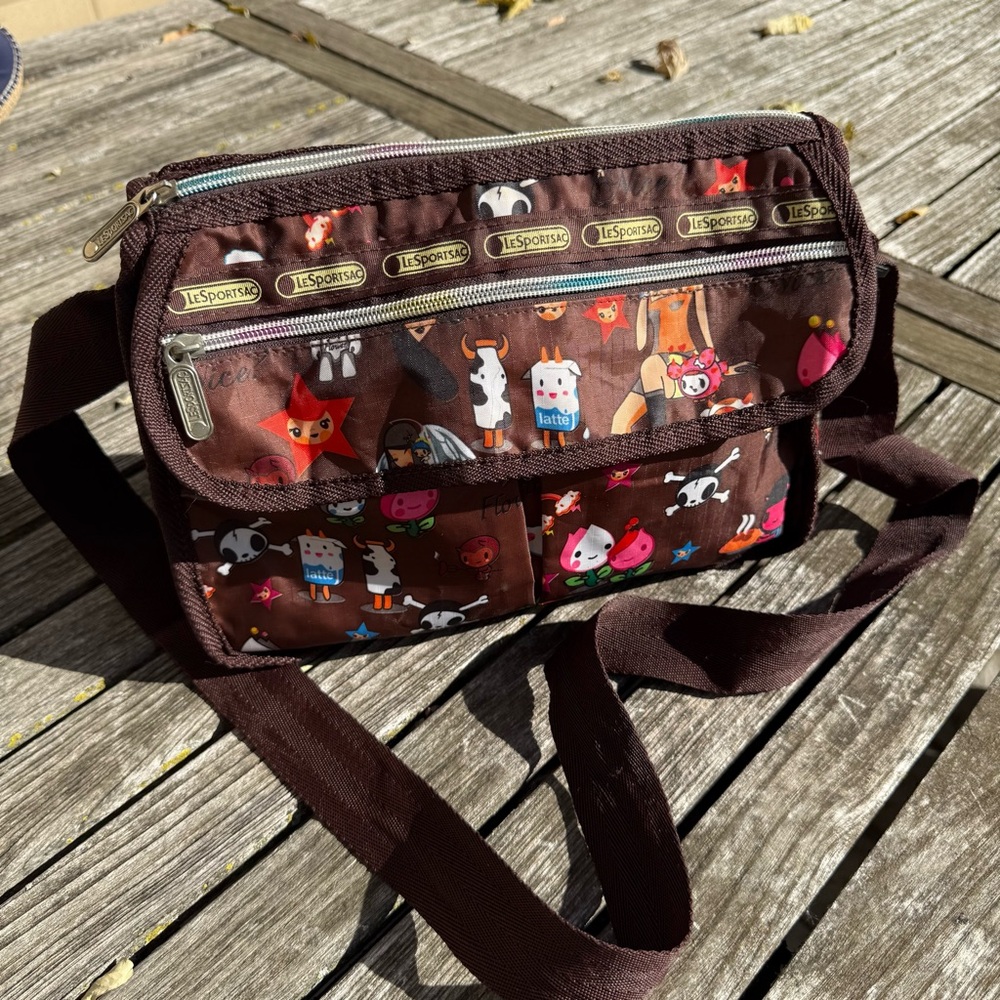 SOLD.   Collab Brown Bag with Animal Motif